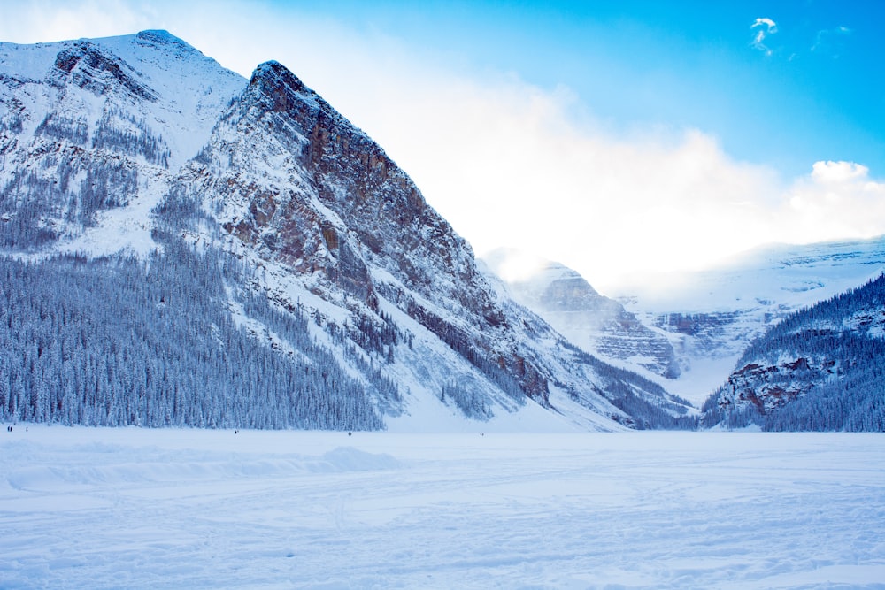 snow covered mountain during daytime