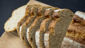 a close up of sliced bread on a cutting board