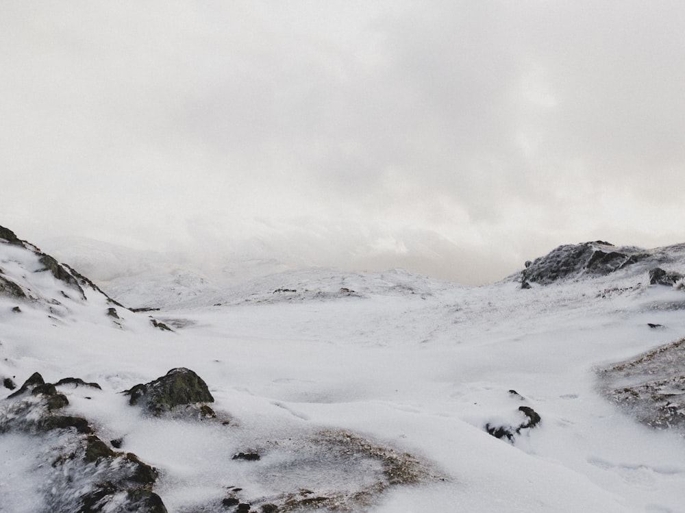 snow covered mountain during daytime