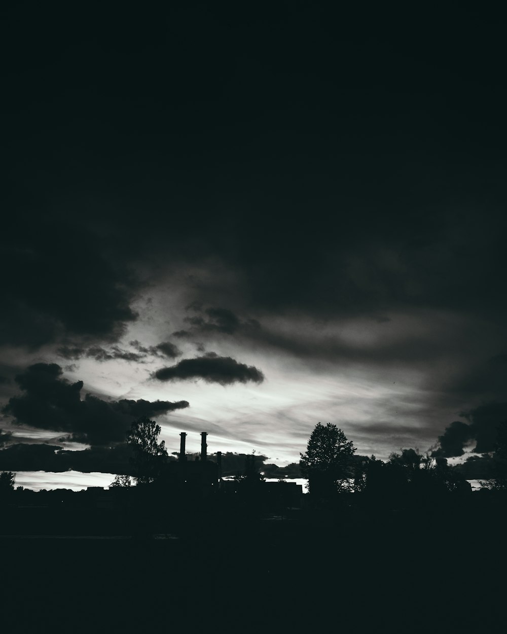 a black and white photo of a cloudy sky