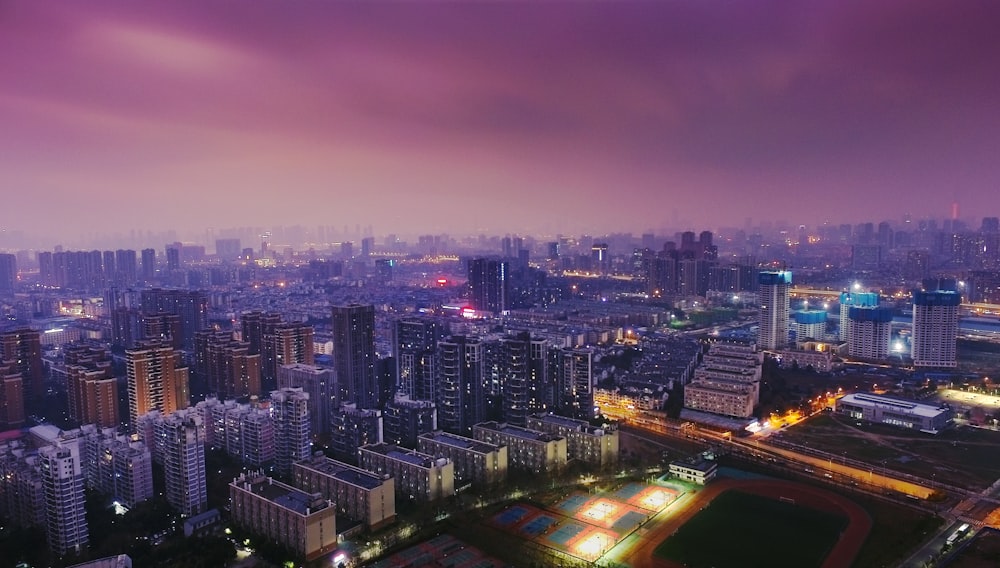 an aerial view of a city at night