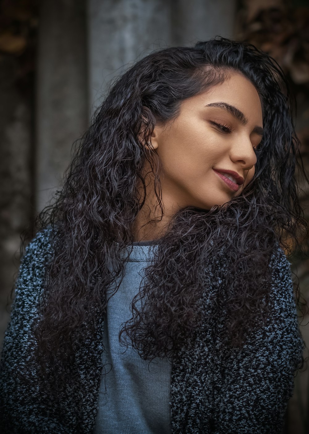 a close up of a person with long hair