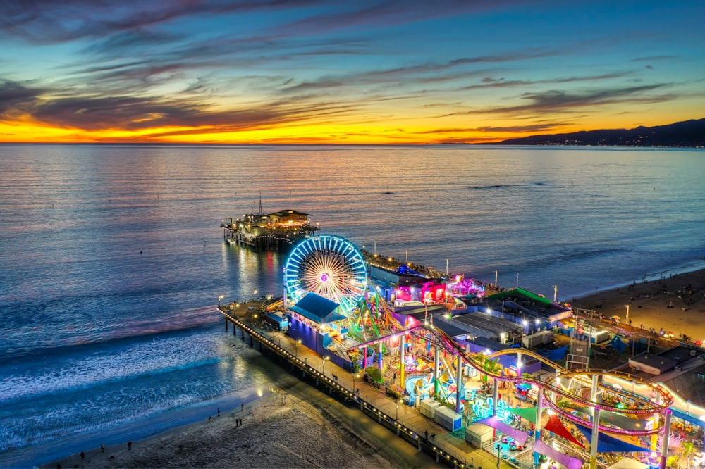 an aerial view of a carnival on the beach