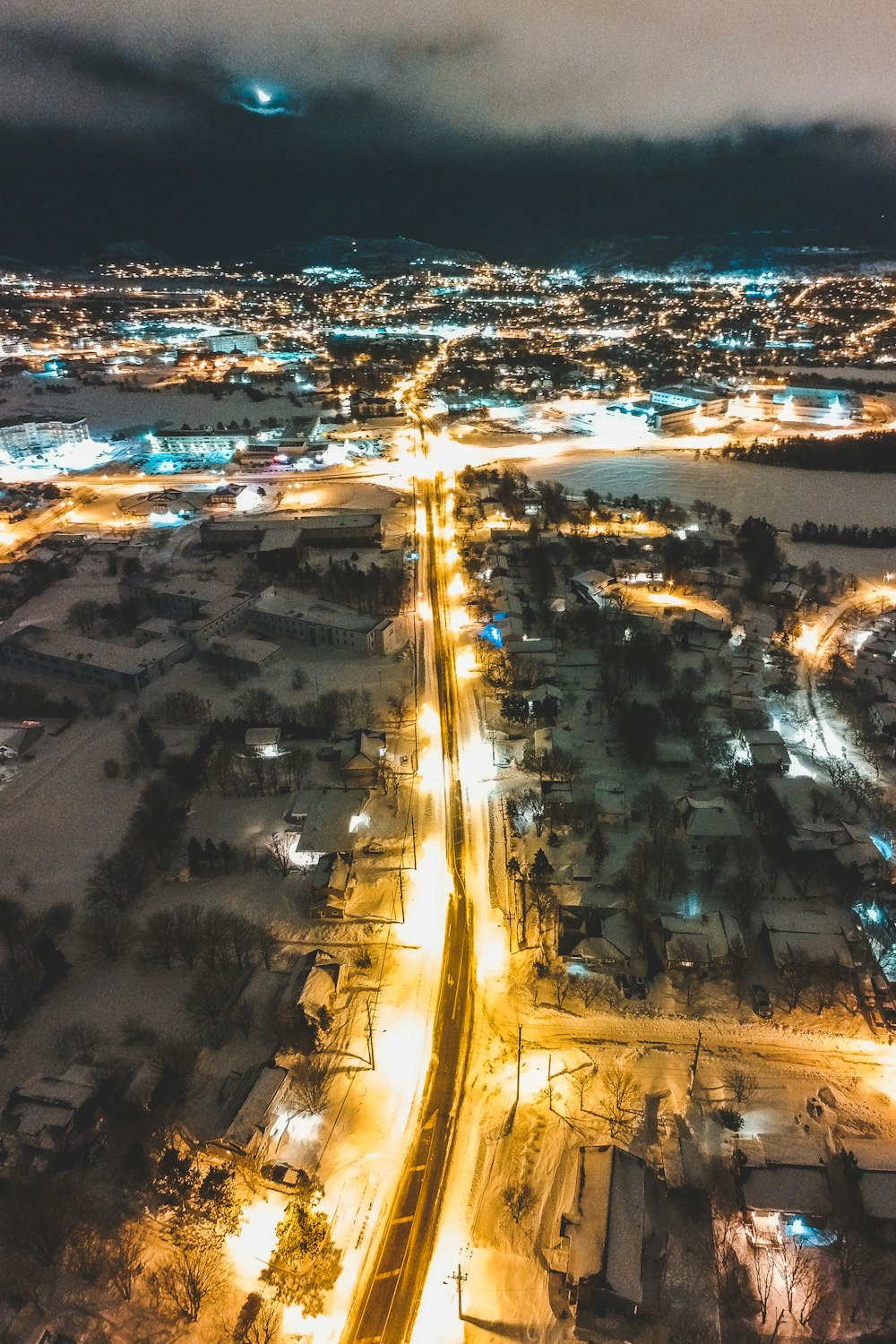 an aerial view of a city at night