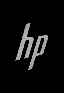 The image displays a stylized lowercase 'hp' logo in white color against a black background.