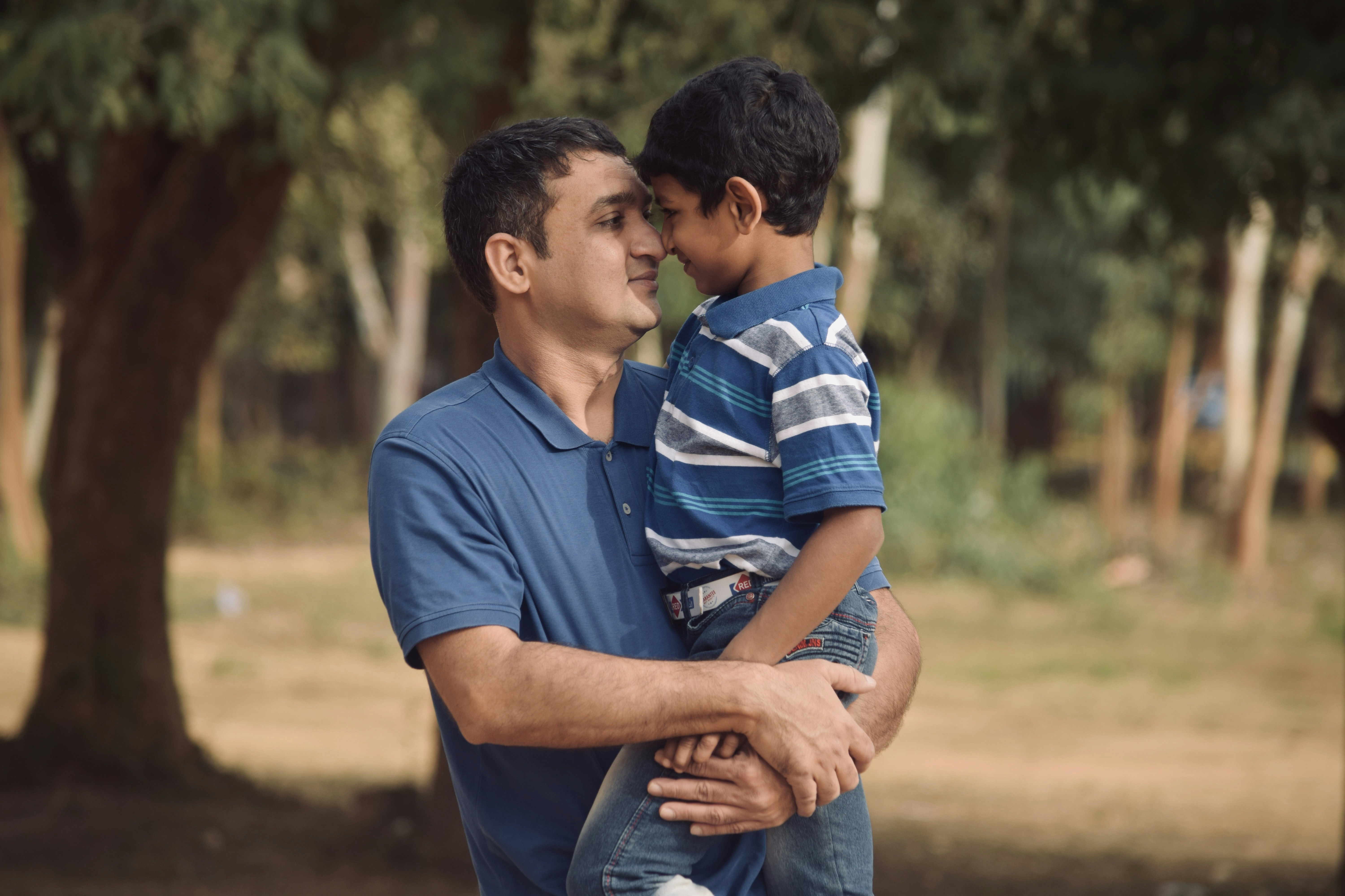Father and child talking, illustrating emotional support