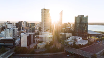 A vibrant cityscape at sunrise symbolizing fresh news and new opportunities.