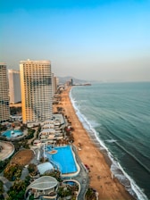 high rise buildings near sea during daytime
