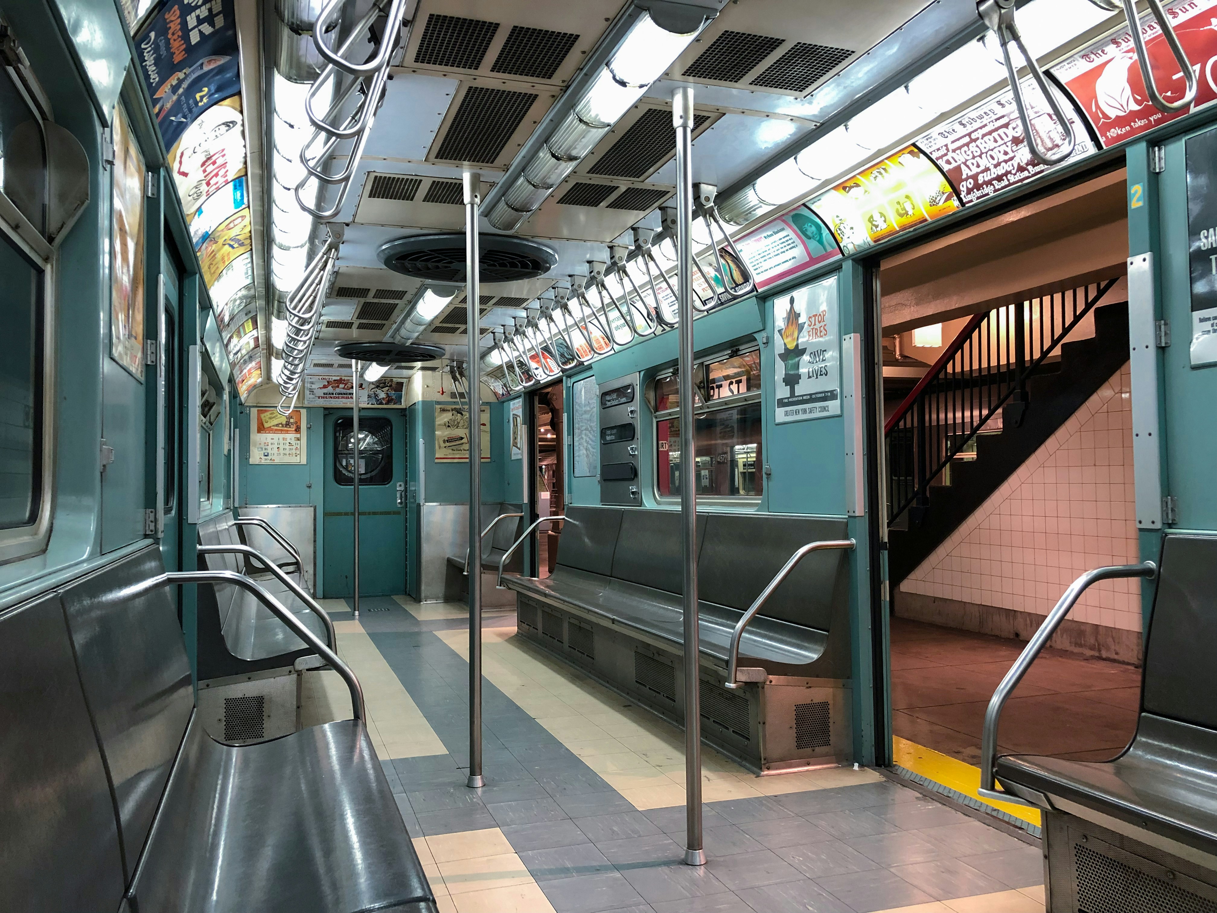 stainless steel train rail during daytime