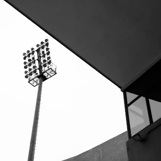 grayscale photo of street lights