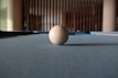 A close-up of billiard table felt in black color.