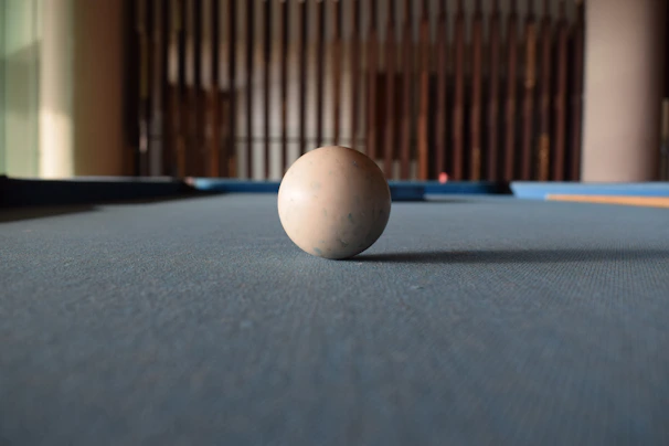 Close-up of a polished pool table corner showing fine craftsmanship