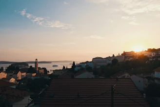 Sunset view of San Miguel Arcángel parish with warm colonial tones.