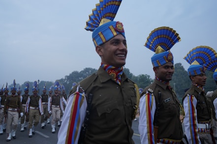 a group of men in uniform marching down a street