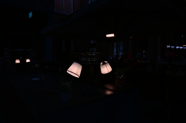 Background video still of a cozy lofi girl style room with soft neon purple lighting.