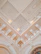 A renovated rental house ceiling showcasing neat gypsum work.