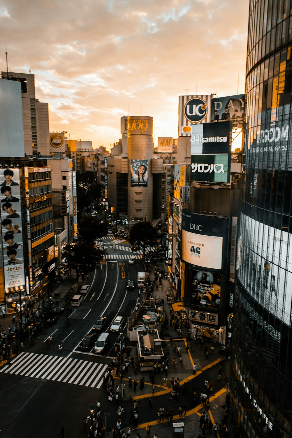 a city street with a lot of tall buildings