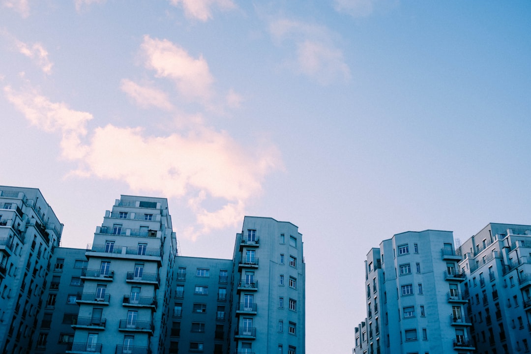 white concrete building under blue sky during daytime