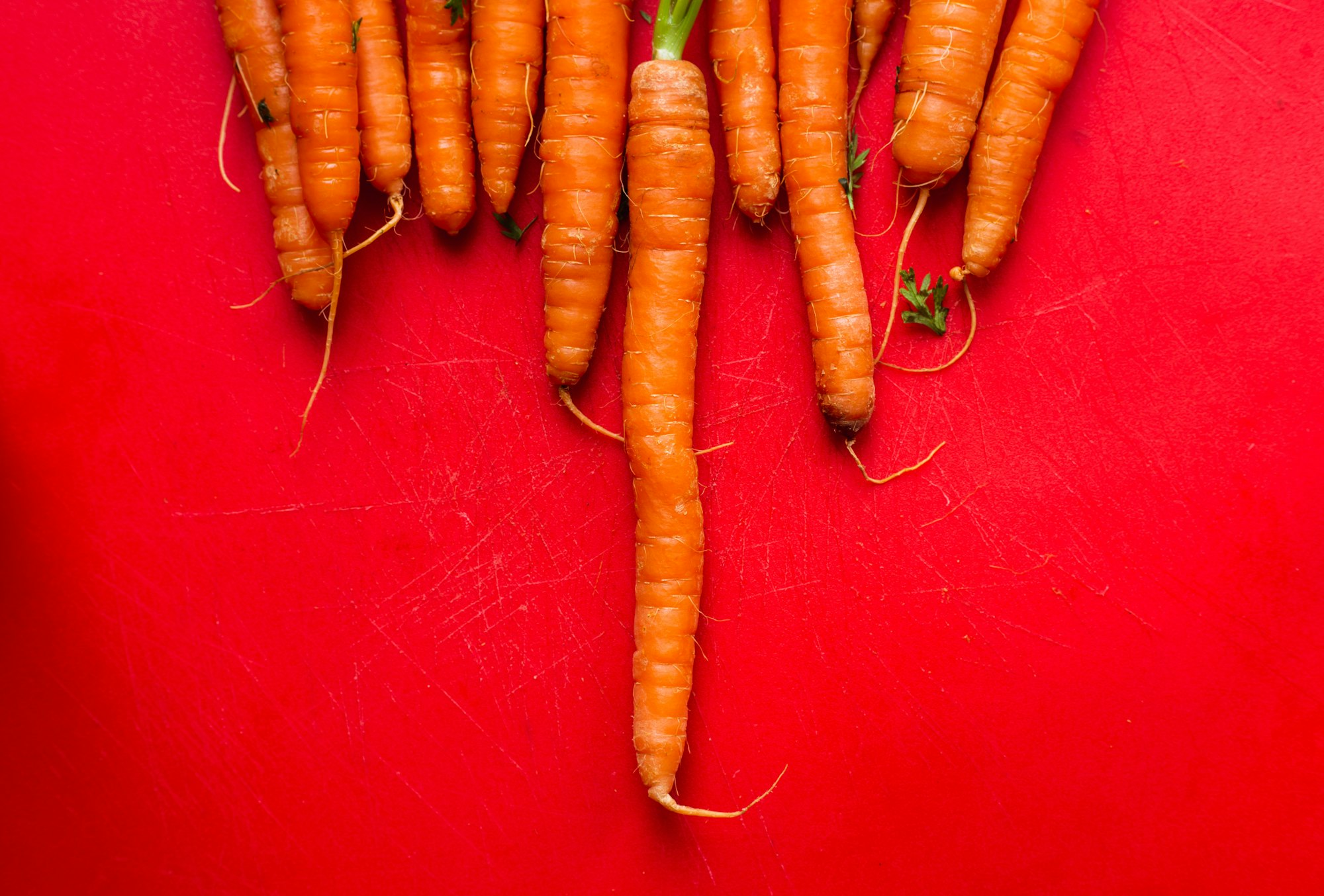 Carrots are an orange rainbow food by Louis Hansel for Unsplash