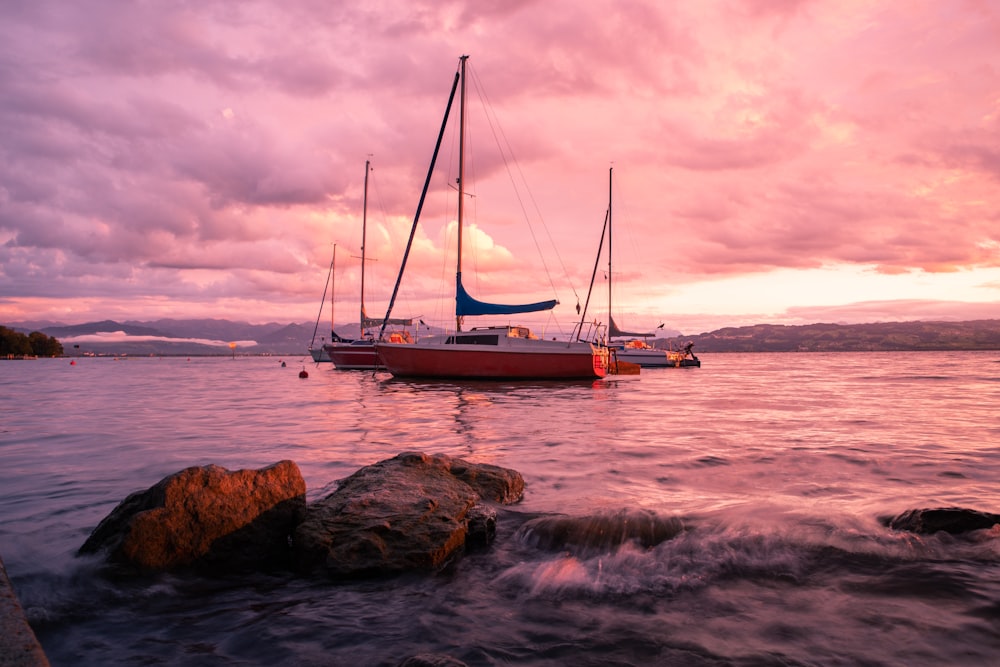 a couple of boats that are sitting in the water