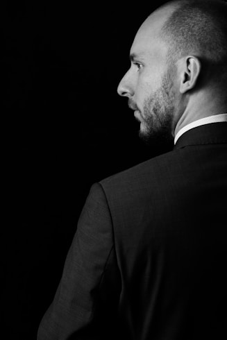 man in black suit jacket