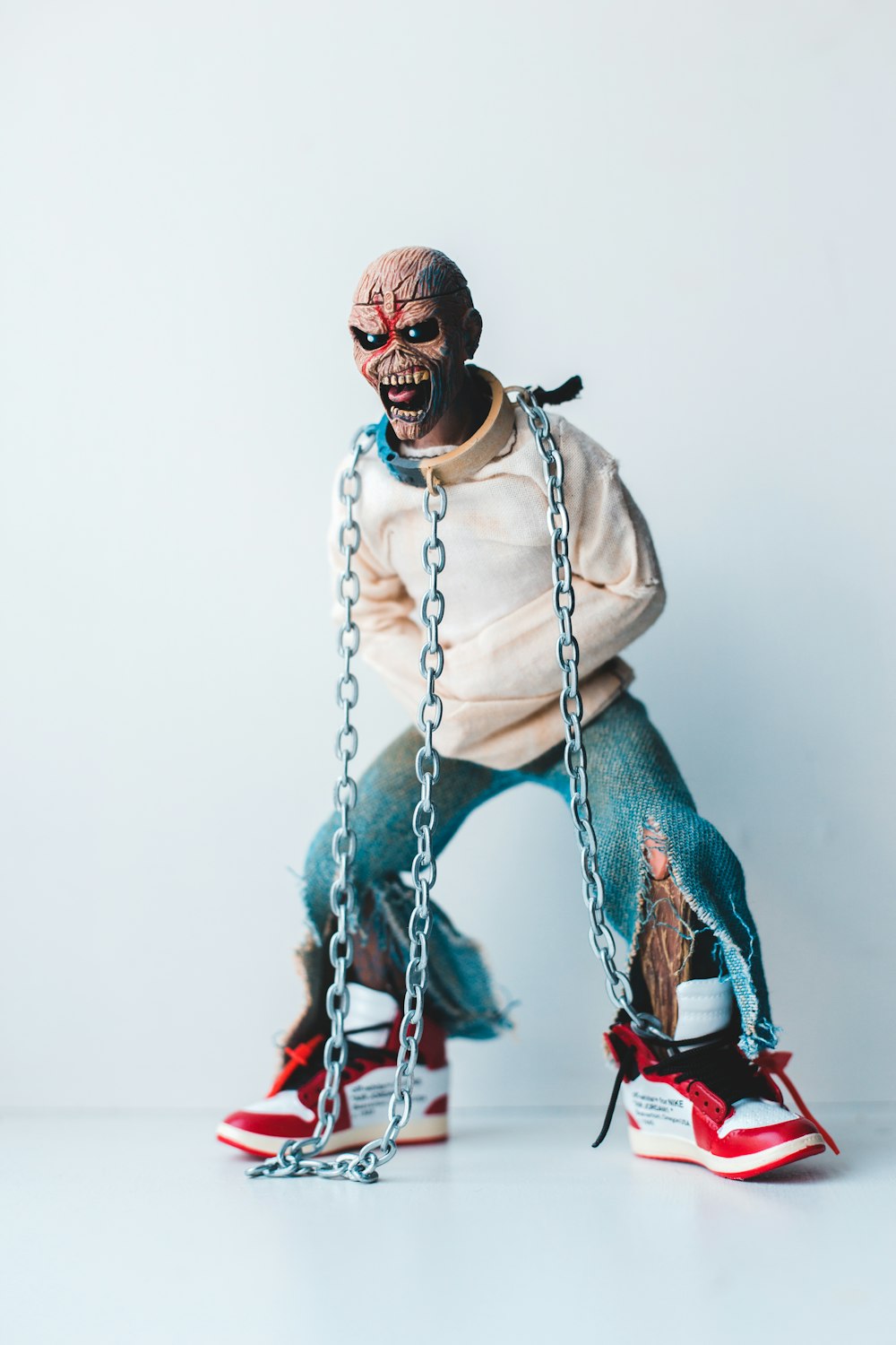 a man with chains attached to his feet