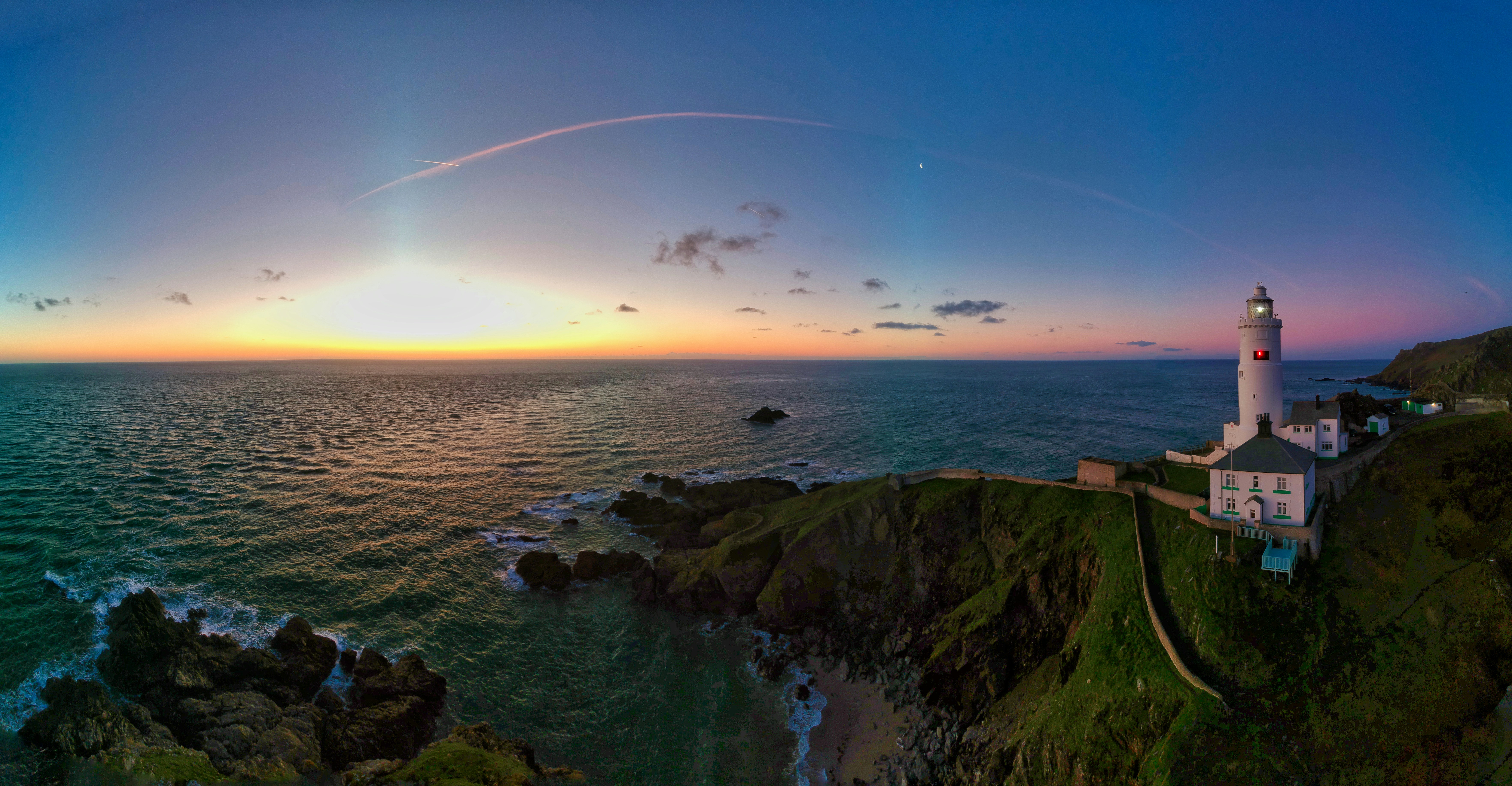Winter sunrise over Start Point Lighthouse, Devon, UK