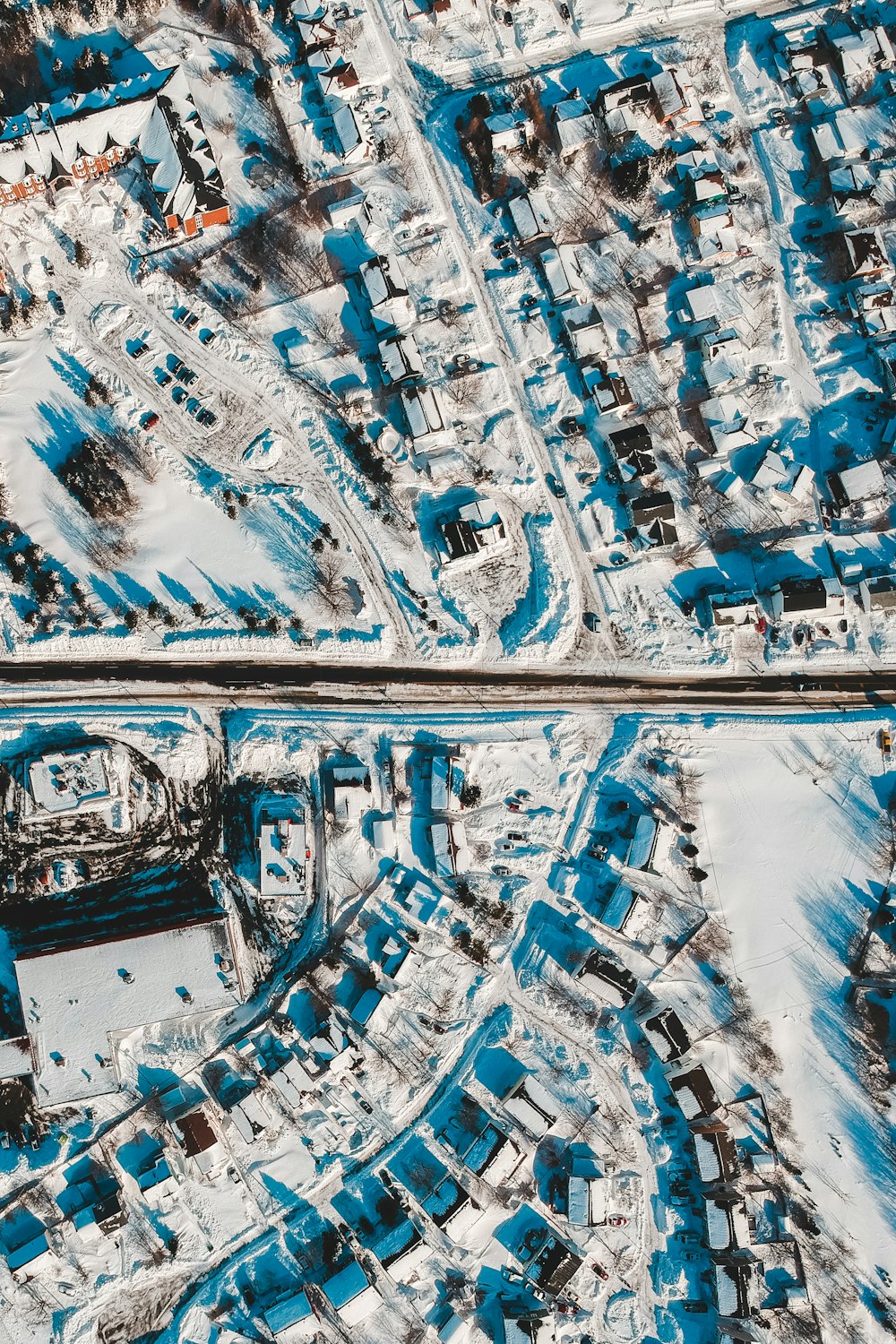 an aerial view of a city in winter