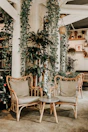 Cozy seating area with a small table and chairs in the Garden Suite.