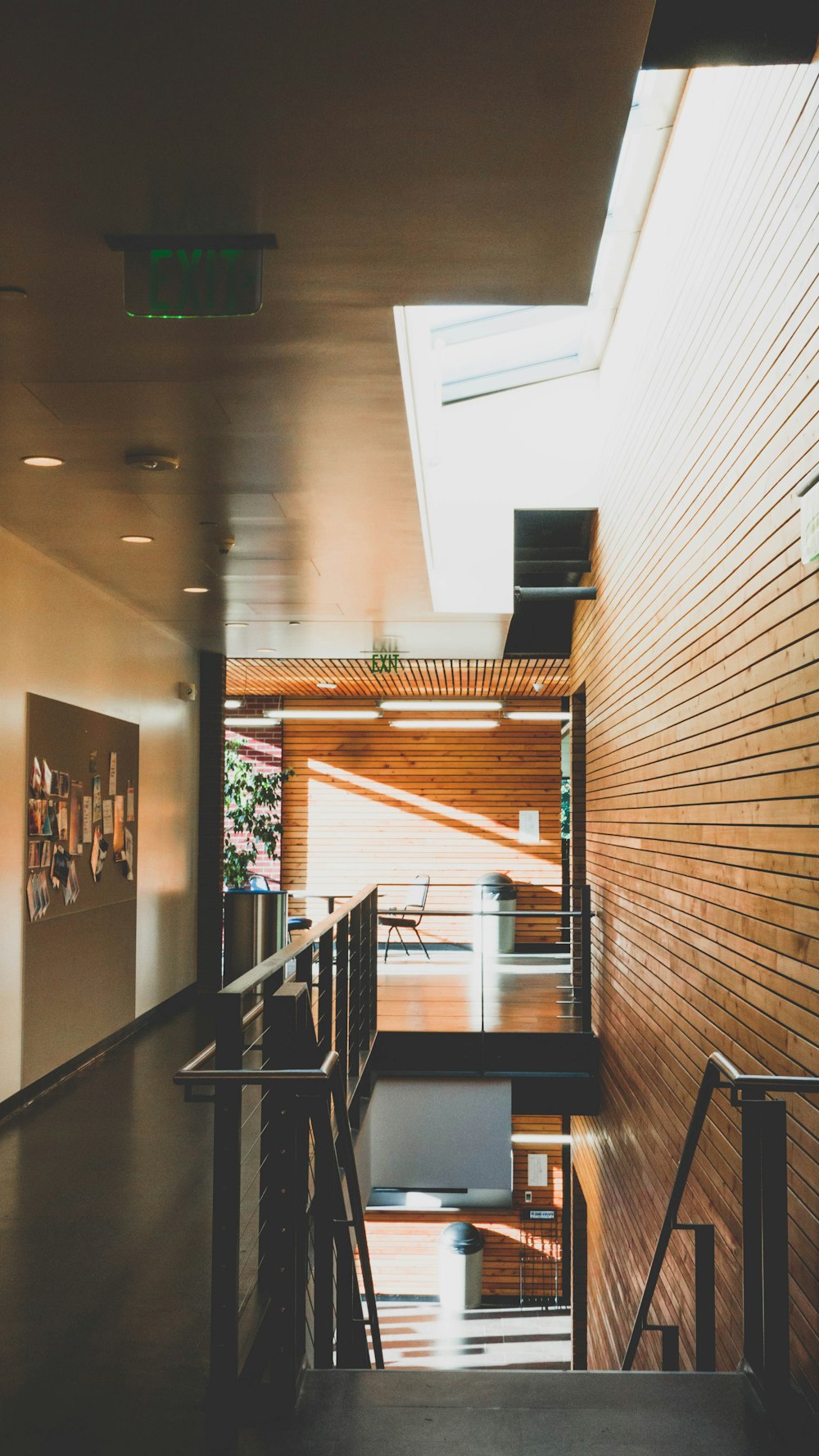 black wooden table near brown wooden staircase