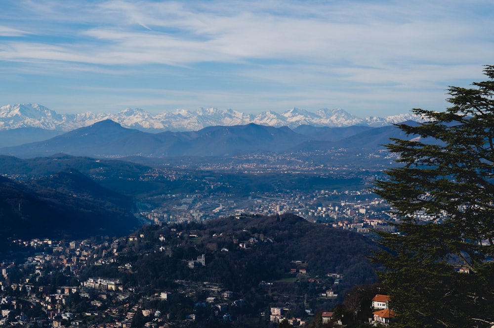 aerial view of city near mountains during daytime