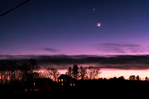 A serene twilight scene with a soft glowing light symbolizing the passage to the afterlife.