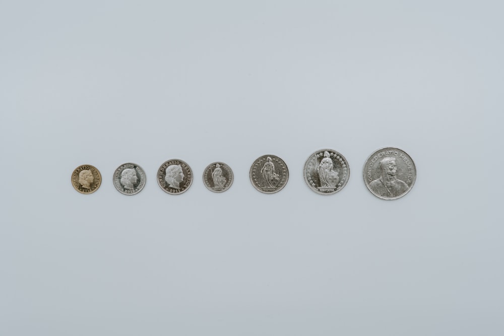 a row of five different types of coins