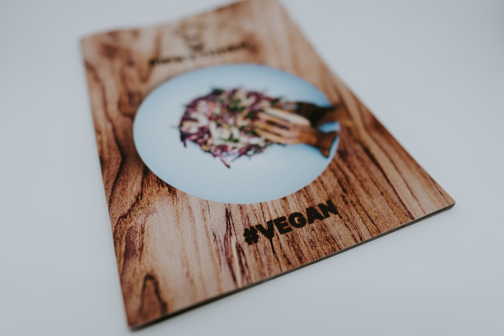 a picture of a plate of food on a wooden board