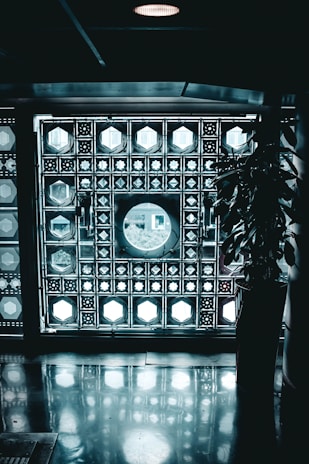 Islamic-style patterned glass panel used as a decorative wall feature.