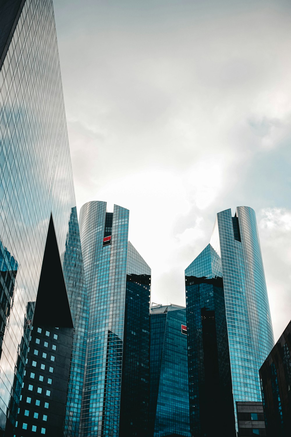 a group of tall buildings sitting next to each other