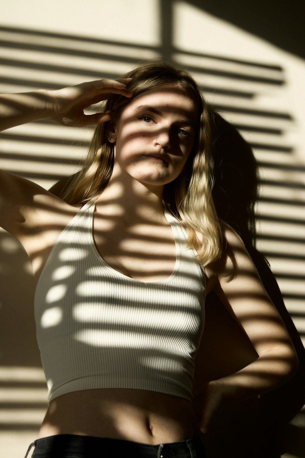 woman in white tank top