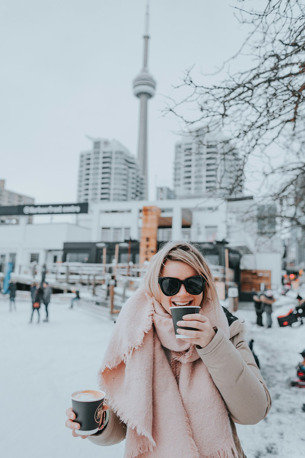 a woman is taking a picture of herself in the snow