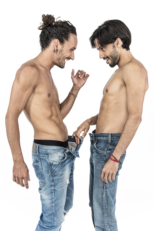 a couple of men standing next to each other