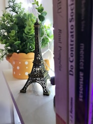 eiffel tower miniature on white table