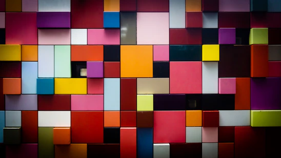 A vibrant, irregularly shaped colorful block pattern symbolizing creative marketing.