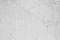 a black and white photo of a concrete wall