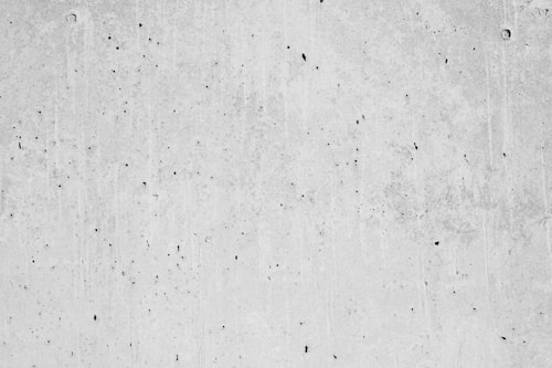 Cracked concrete garage floor before coating