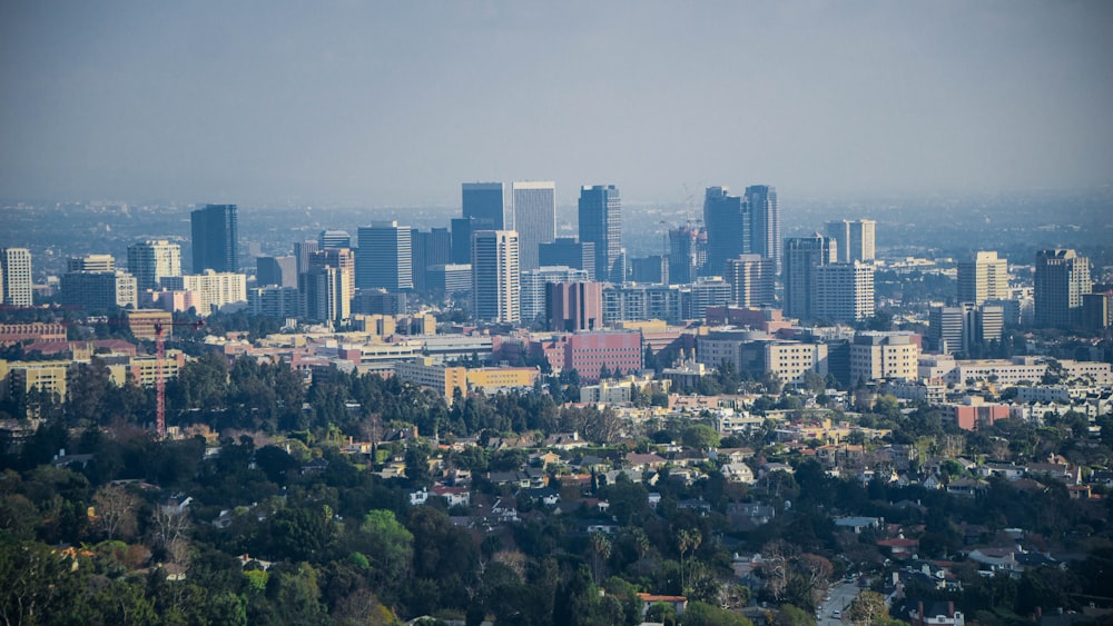 a view of a city with tall buildings