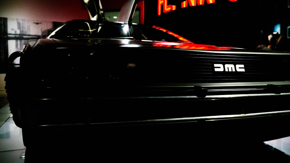 a close up of the back of a car at night