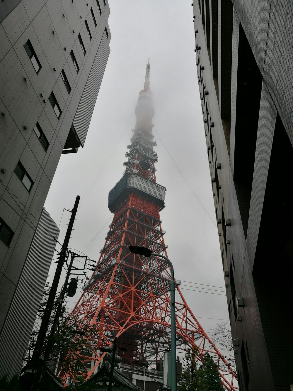 red and white tower in the city