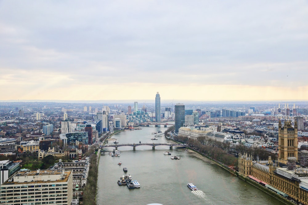 a river running through a city next to tall buildings