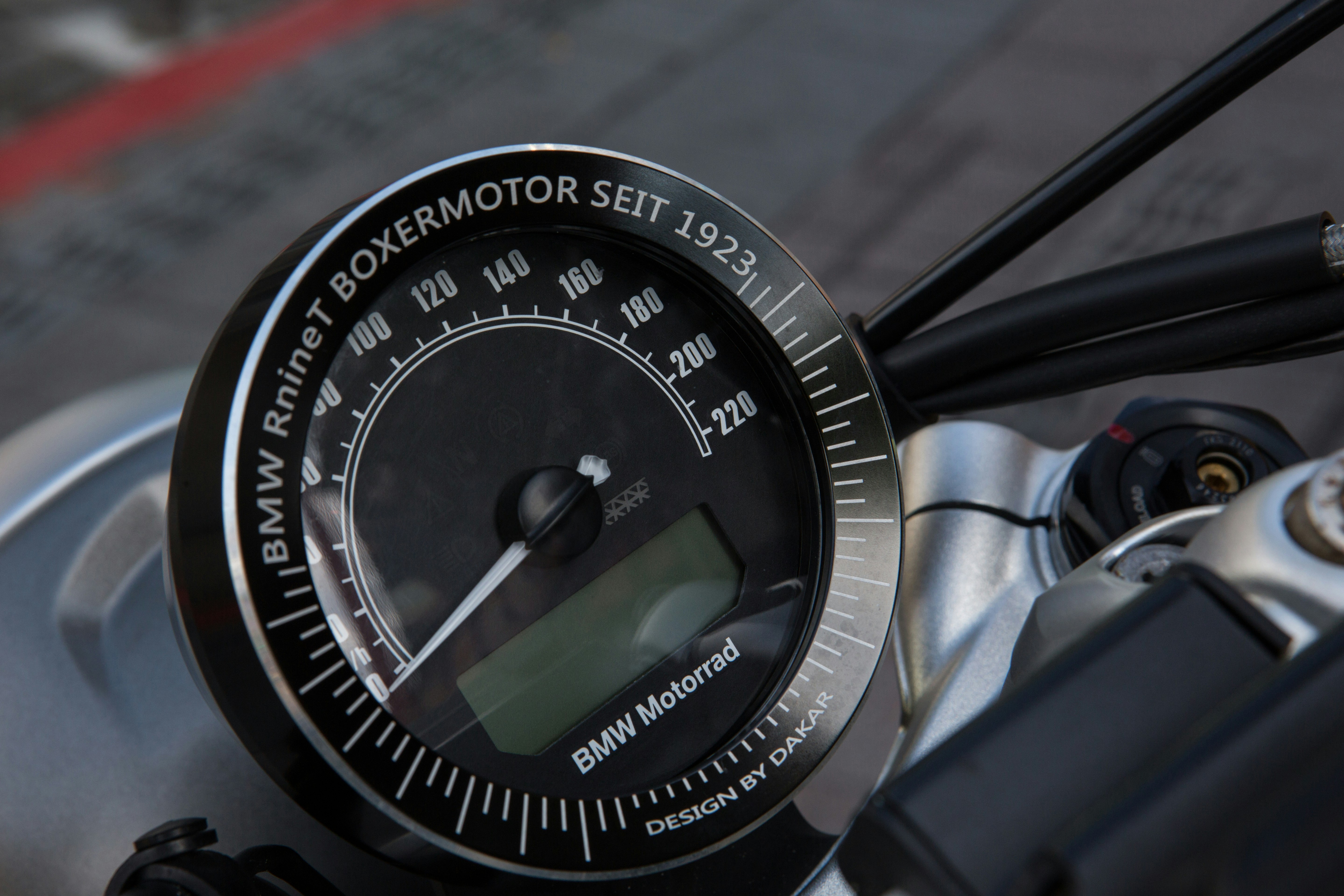 black and white analog speedometer