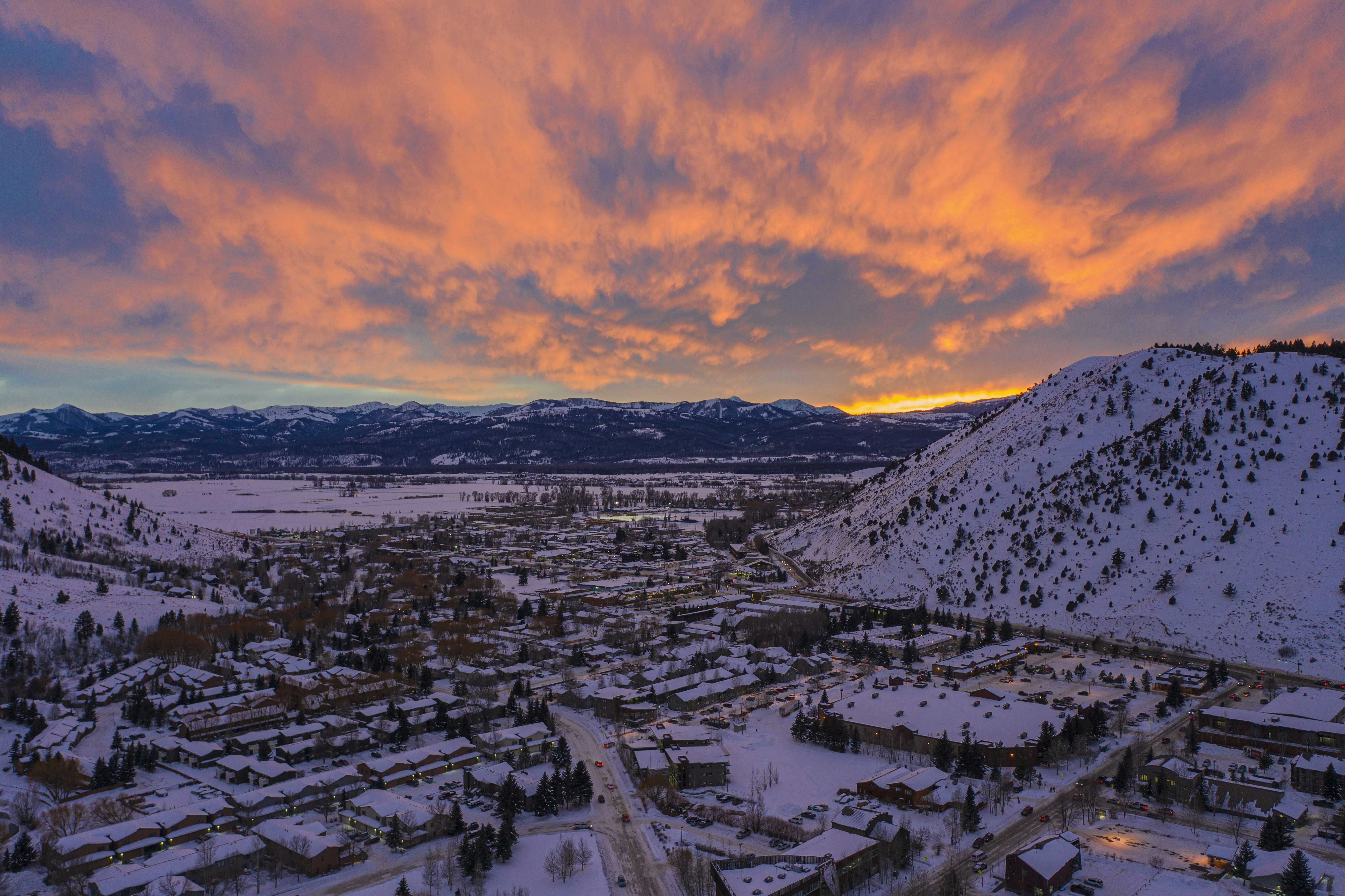 aerial view of city near mountain during daytime