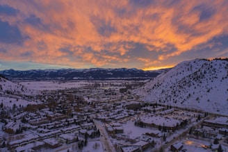 aerial view of city near mountain during daytime